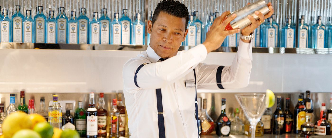Bar tender at Amici Lounge on Emerald Cruises